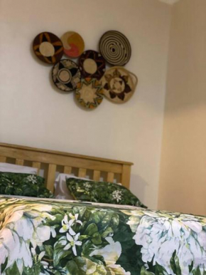 Spacious studio apartment in a modern high-security building with lift access Includes free parking in Muyenga kampala